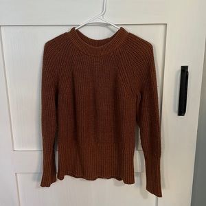 Rust colored Universal Threads sweater.